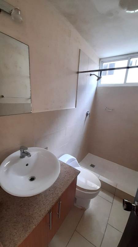 Compact bathroom with frosted window walk-in shower PH Met View Villa de las Fuentes Panama