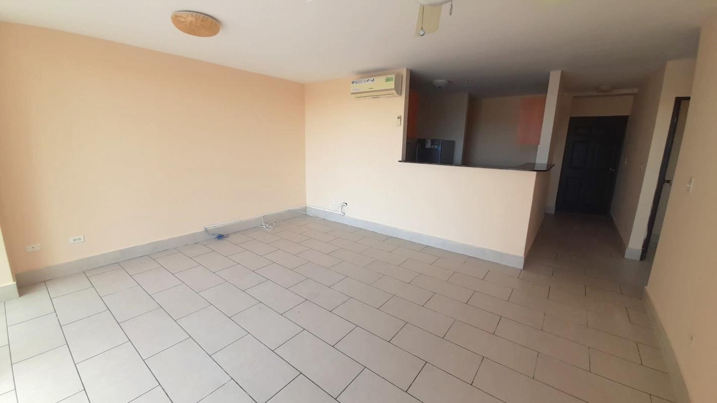 Living room with split AC unit open kitchen PH Met View Villa de las Fuentes Panama