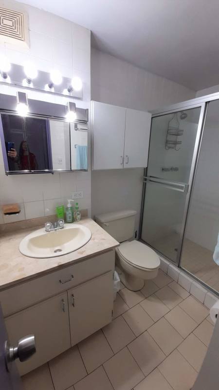 Master bedroom with closet space and window Bahia Marbella Panama City rental apartment