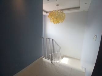 Master bedroom with window and ceramic floors Crown Hills Costa Verde