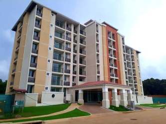 Modern kitchen with granite countertops and natural light in Costa Verde Panama