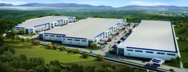 Bird’s eye view of industrial warehouse complex with large parking and loading areas in Colon Free Zone Panama