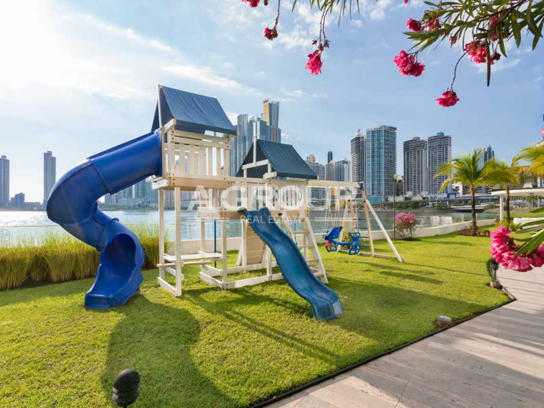Children’s playground with water and skyline views at Miradores at The Point Panama City
