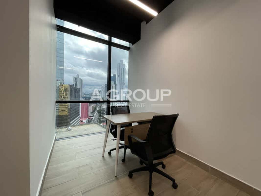 Private office with floor to ceiling corner windows overlooking Panama City skyline Tower Financial Center