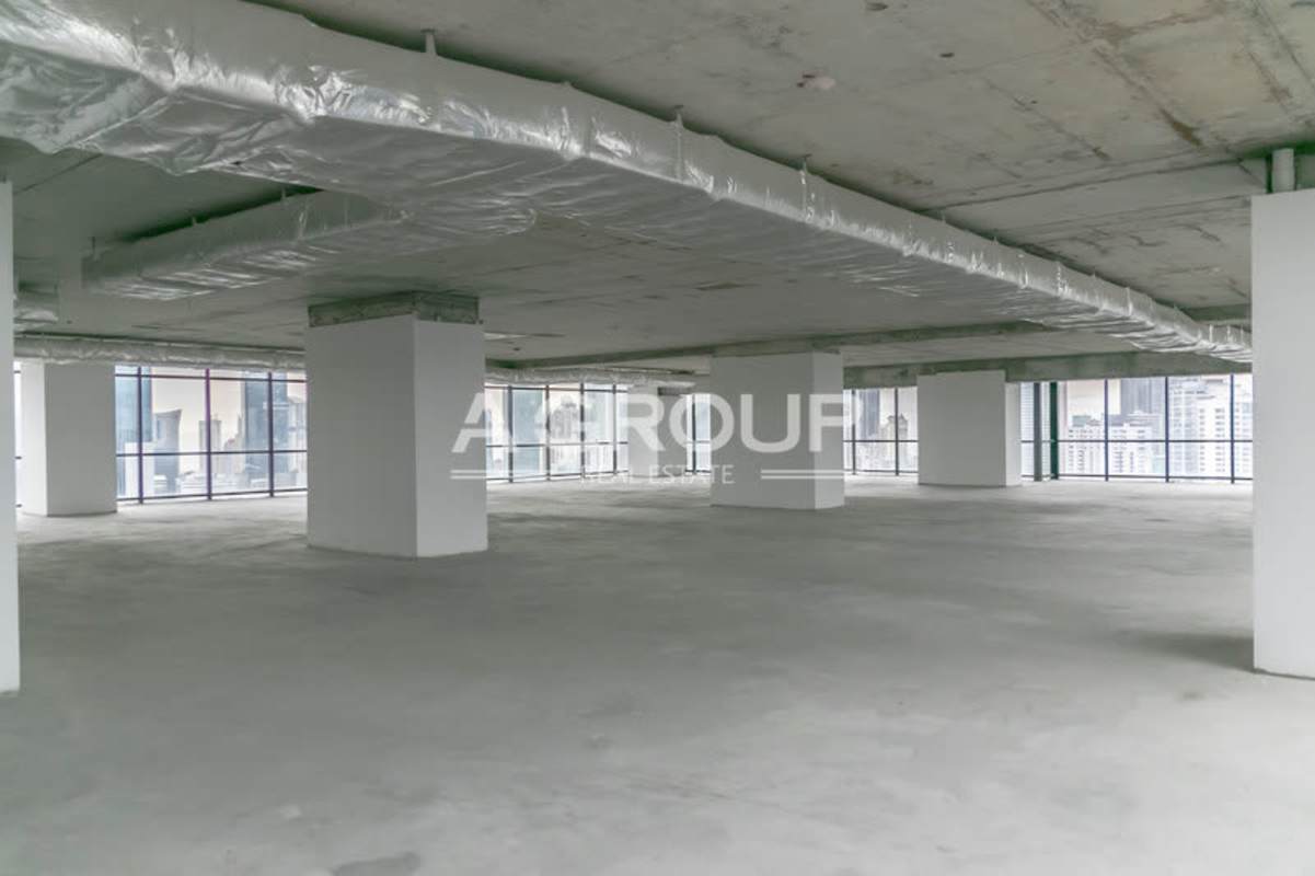 Open shell office space with concrete floors and ceiling Tower Financial Center Panama