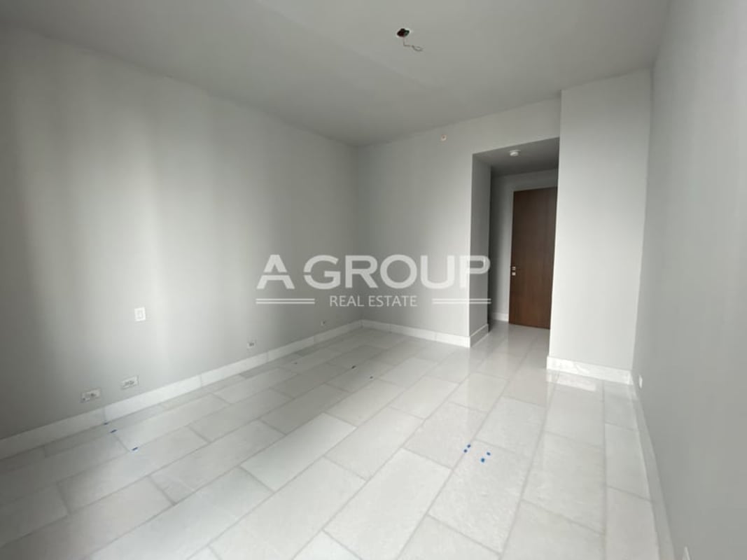 Modern luxury lobby with marble floors and reception at The Towers Punta Paitilla Panama City