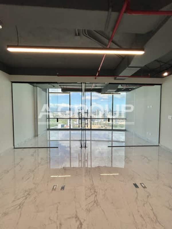 Corporate office interior with glass partition walls, marble floors in Financial Park Tower Panama