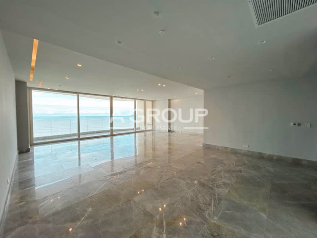 Spacious luxury lobby with marble floors, designer lighting, elegant seating at The Towers Punta Paitilla