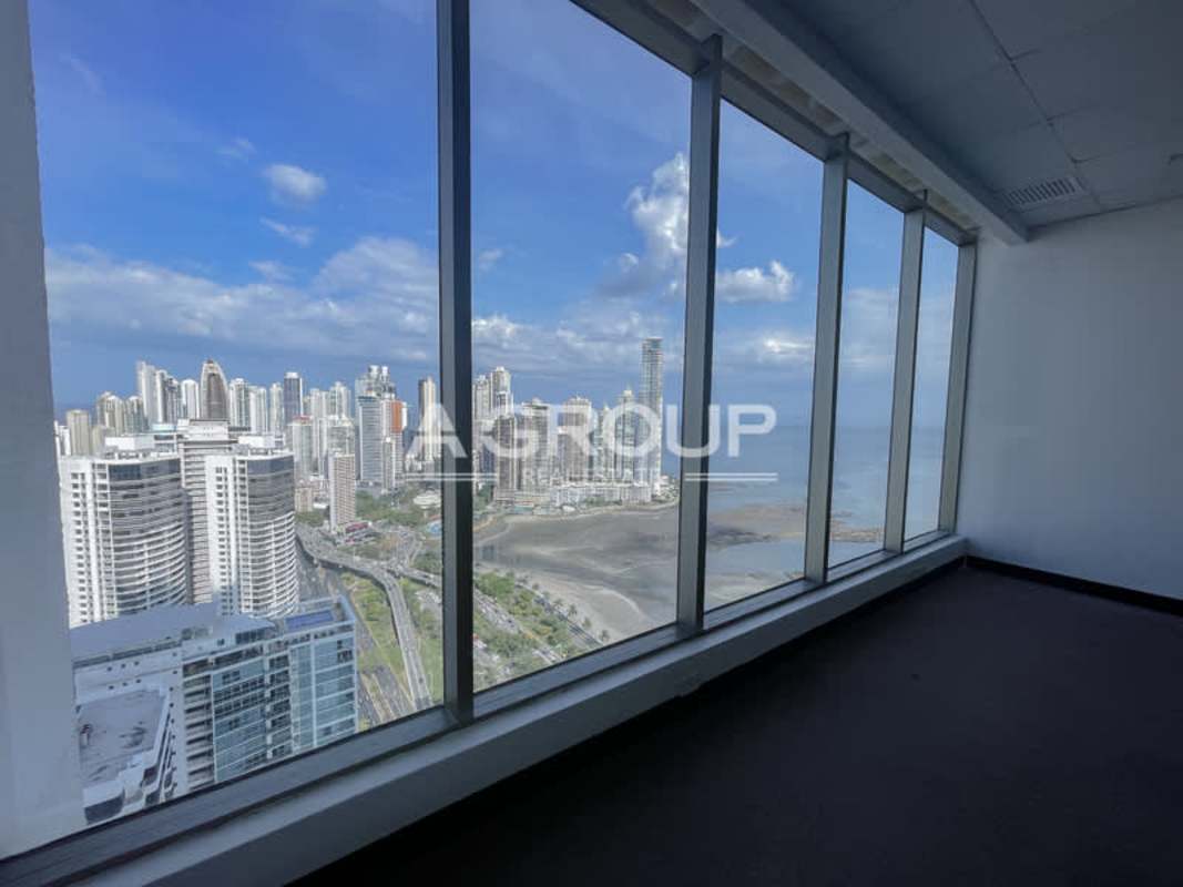 Commercial office space floor-to-ceiling windows panoramic city oceanfront view PH BICSA Tower Panama