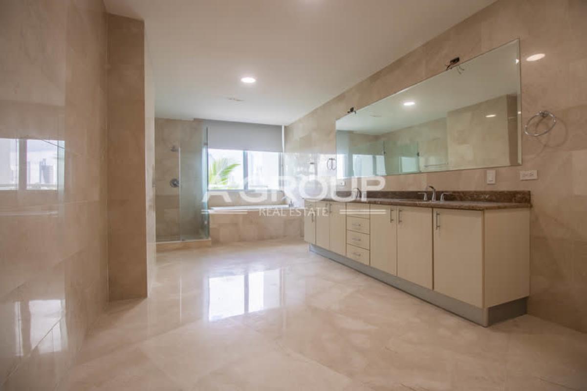 Elegant granite kitchen with breakfast area at Miradores at The Point Punta Paitilla luxury Panama apartment rental