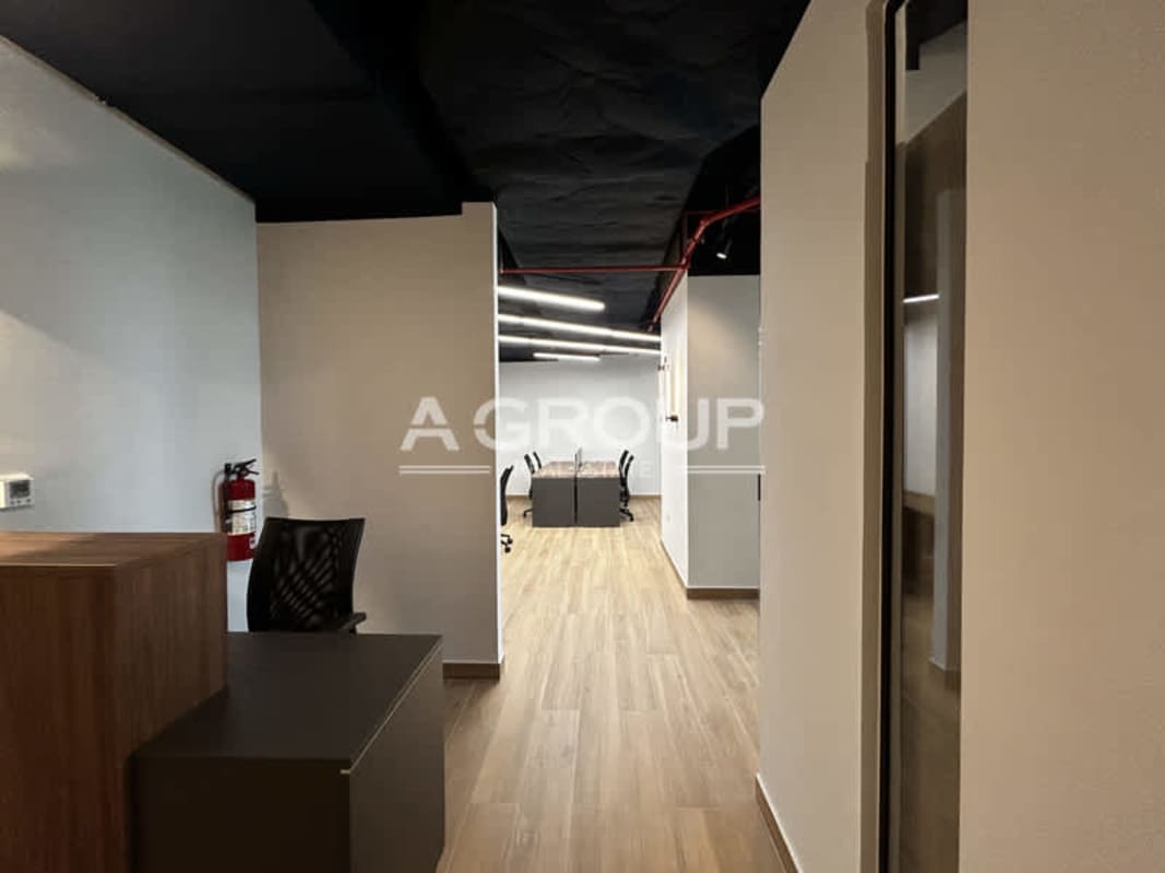 Office open workspace with partitions wooden flooring exposed ceiling PH Financial Center Panama