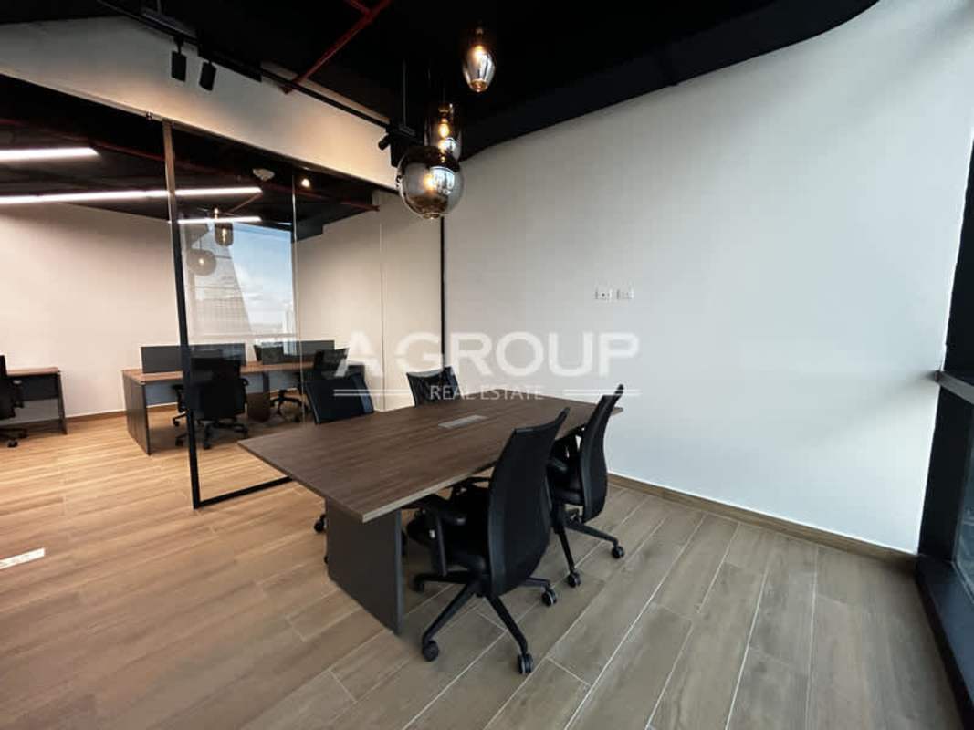 Open plan workspace modern lighting glass partitions PH Financial Center Panama