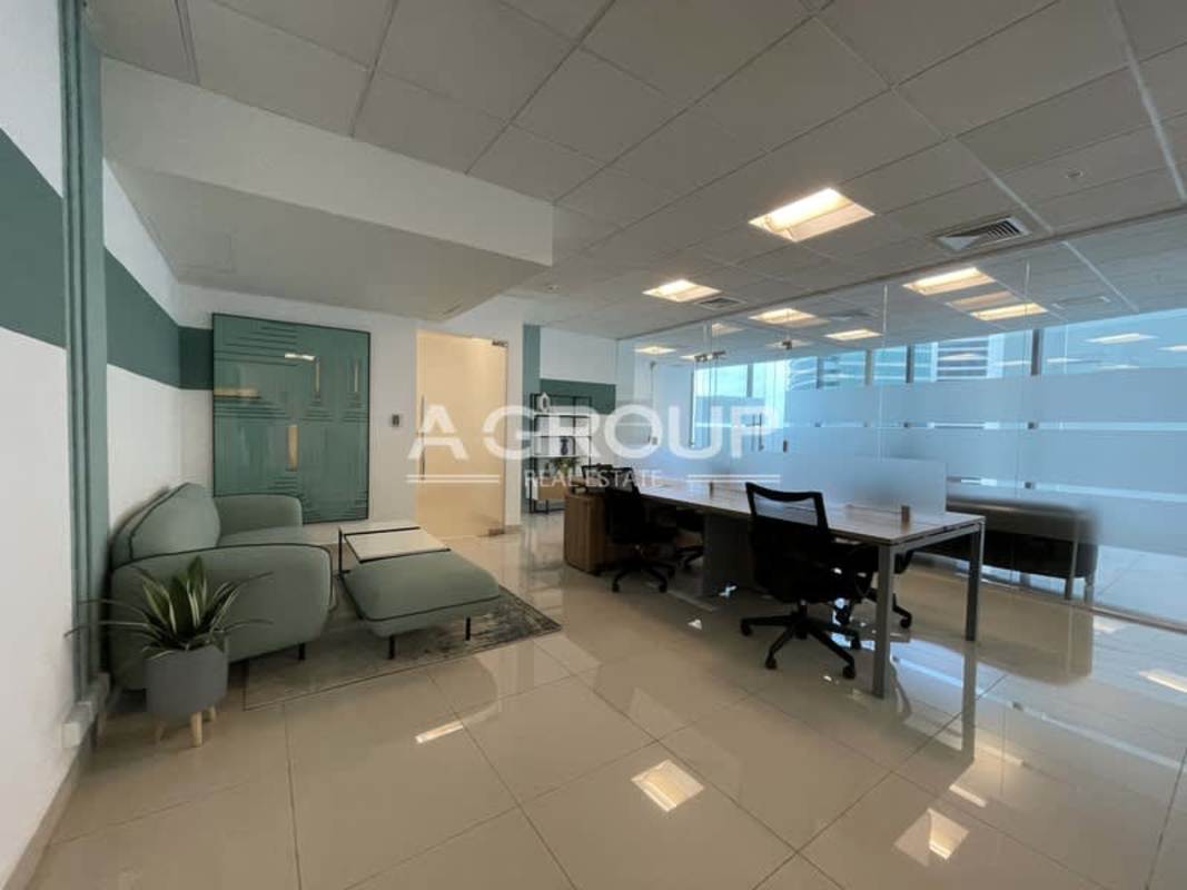 Corporate furnished office with lounge sofa and glass partitions in Financial Park Costa del Este