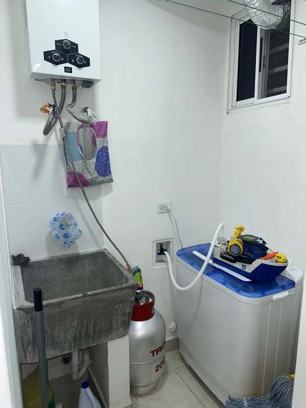 Compact bathroom with shower tiled walls Residences San Cristobal Panama