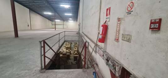 Warehouse with metal roof, exposed beams suitable for storage inside Zona Libre Colon Panama