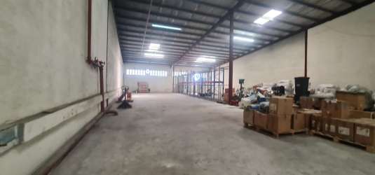 Warehouse with mezzanine level, high ceilings, open storage area in Colón Panama