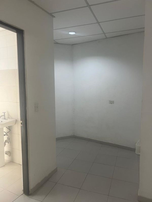 Minimalist small office interior space at Metropark business complex Panama City