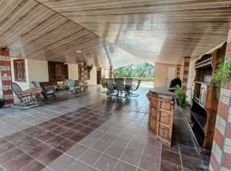 Large covered terrace patio with BBQ at beach house El Celaje Panama