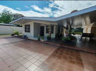 Bright living room with large windows beach house El Celaje Nueva Gorgona Panama