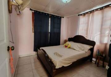 Bright master bedroom windows ceramic tile beach home Nueva Gorgona Panama