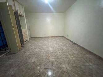 Empty minimalist bedroom with beige walls, wardrobe in Boquete property