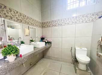 Modern bathroom double vanity granite countertops floral tile Boquete Panama