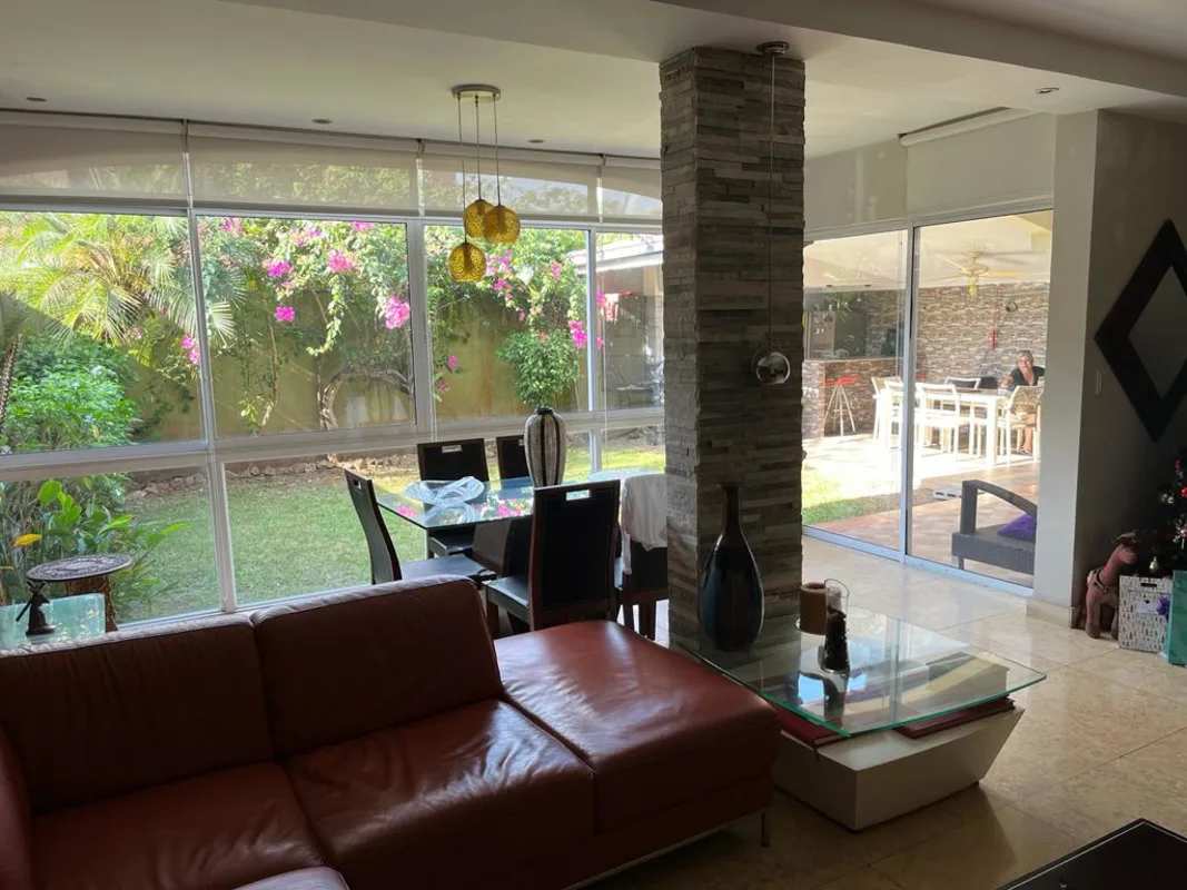 Large covered backyard terrace lounge and barbecue area with garden Versalles I Panama City