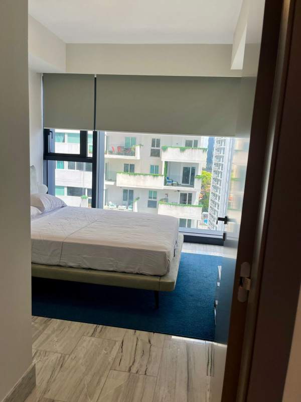 Bedroom with floor to ceiling windows panoramic ocean view in PH Nuovo Panama