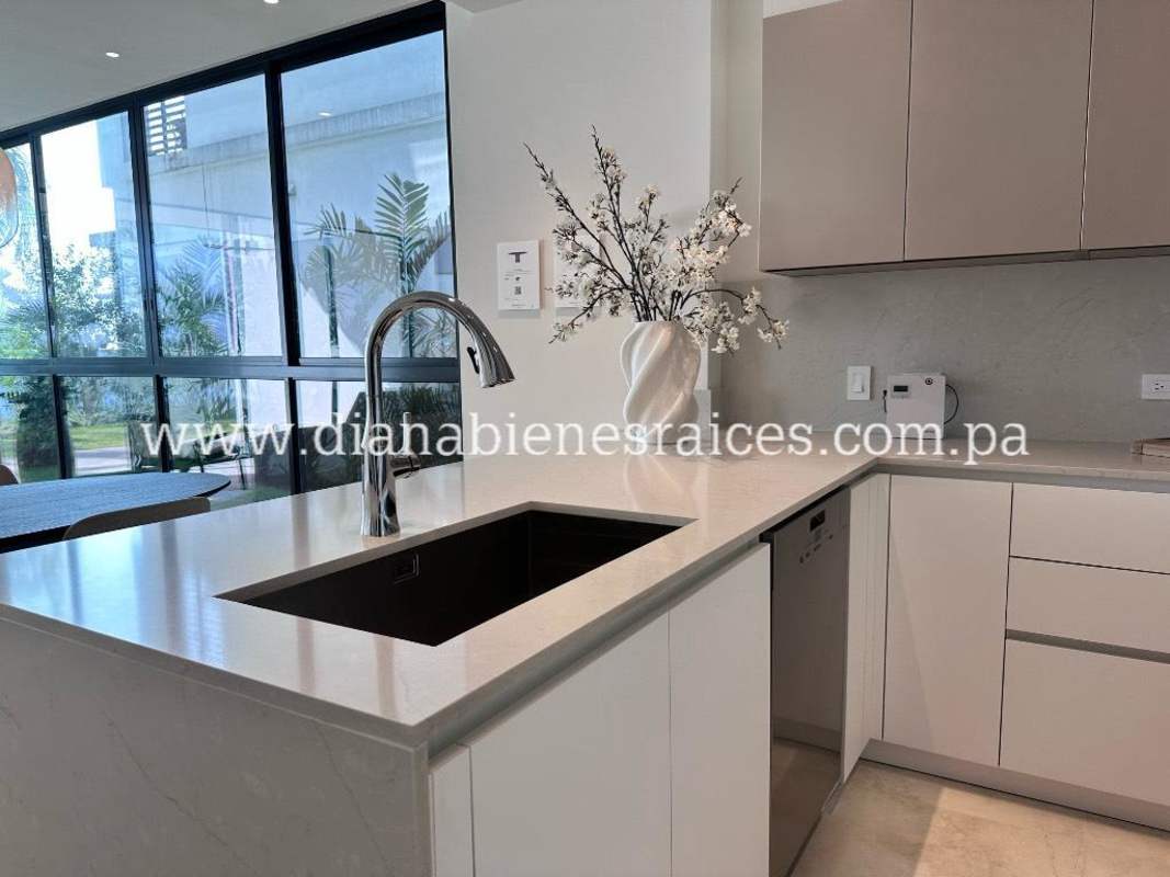 Bright living room with panoramic Pacific Ocean views, luxury apartment at Ocean Reef Islands Panama City