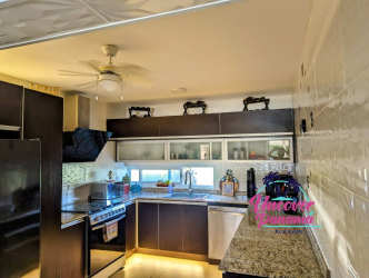 Saltwater pool with lounge chairs, terrace, tropical gardens Costa Blanca Panama