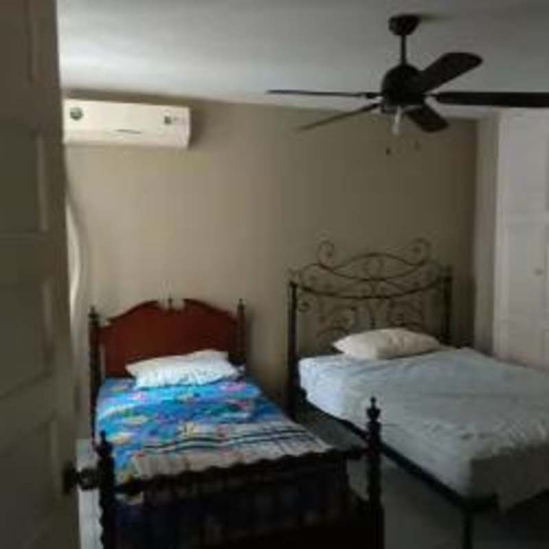 Spacious bedroom with built-in closet and window in PH Parque Dorado Vista Hermosa Panama