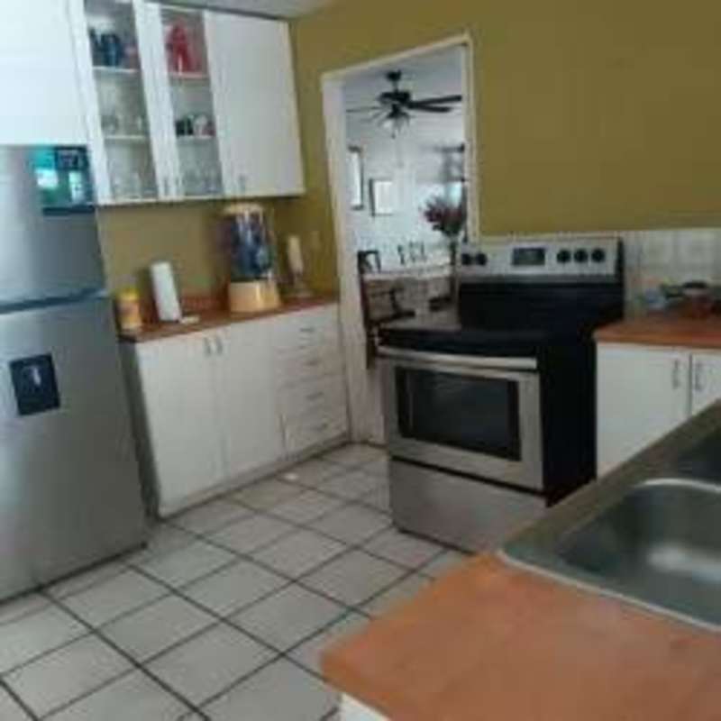 Bedroom with twin beds, AC, ceiling fan at PH Parque Dorado El Dorado Panama City