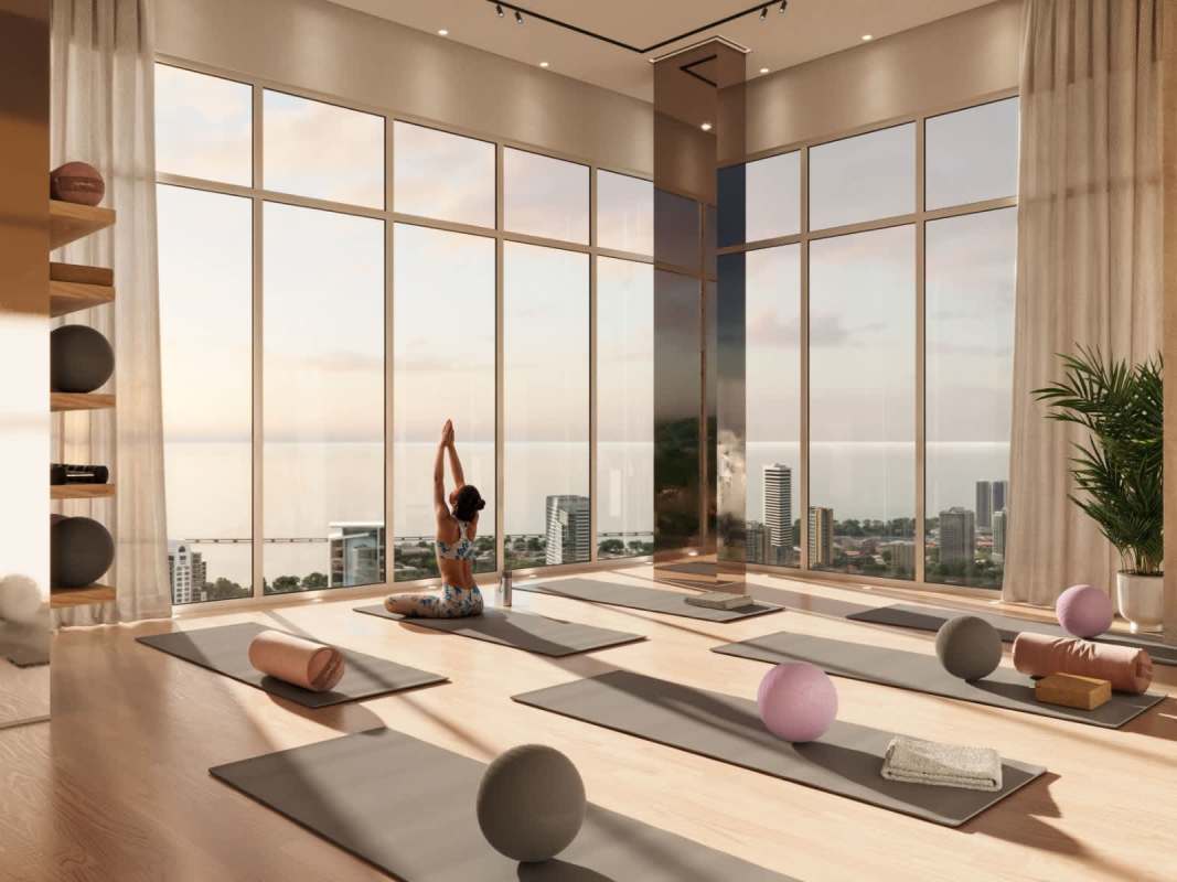 Modern highrise yoga studio panoramic city ocean view Costanera Panama fitness