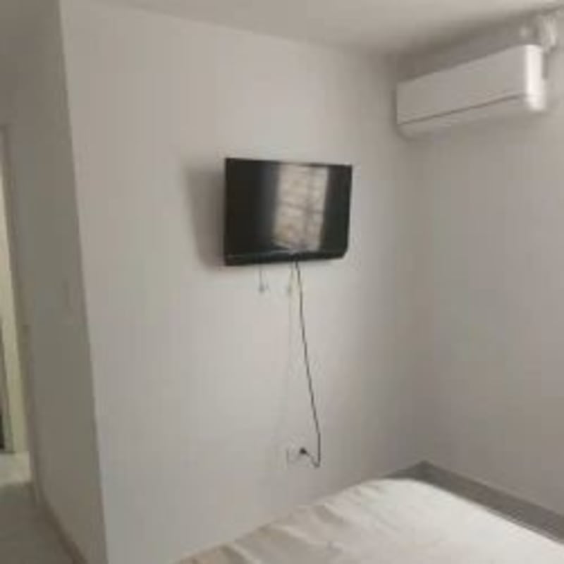 Living room with TV area, ceiling fan and natural light apartment Rio Abajo Panama