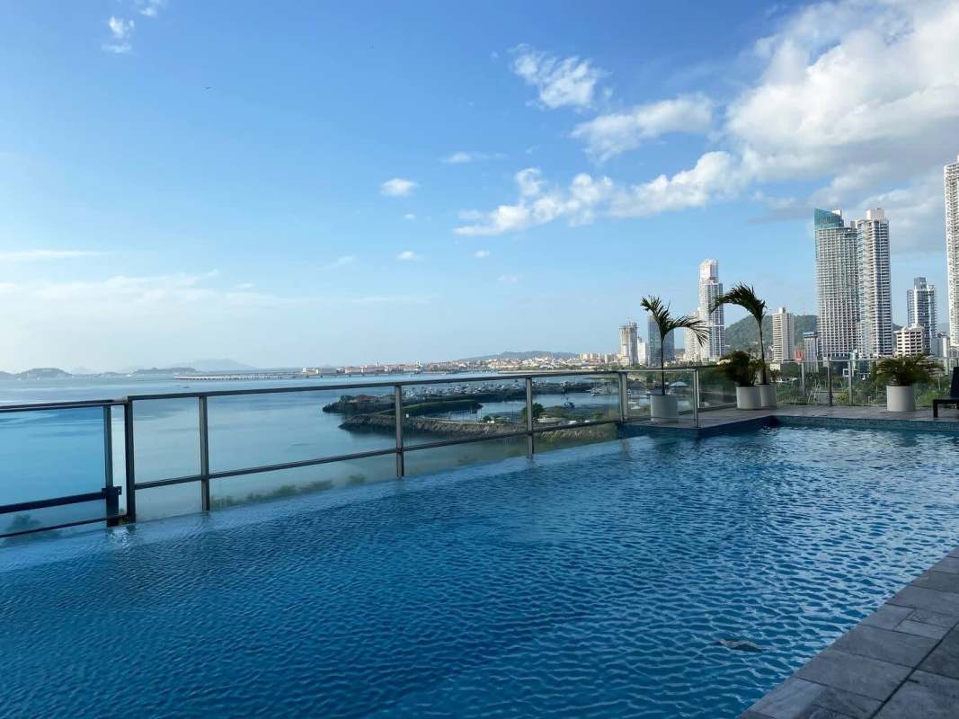 Fully-equipped gym with panoramic oceanfront windows at PH Waters Panama