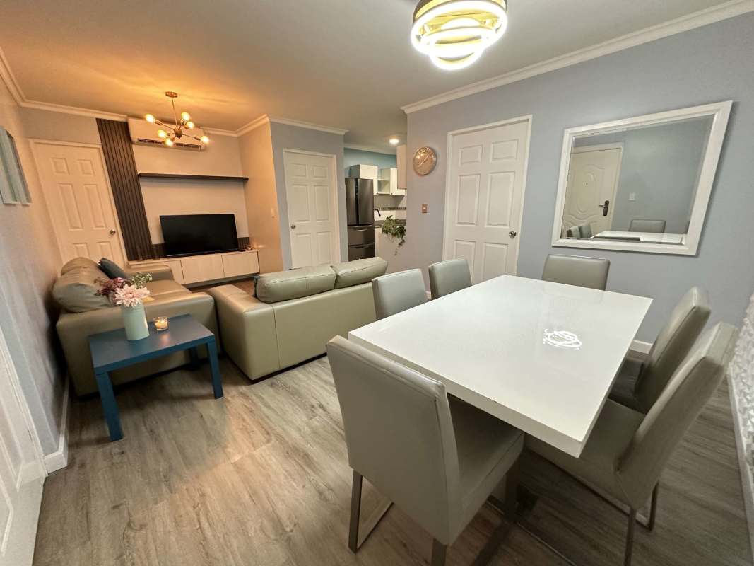 Bedroom with built-in wardrobe, ceiling fan, natural light at PH Bella Vista Place Panama