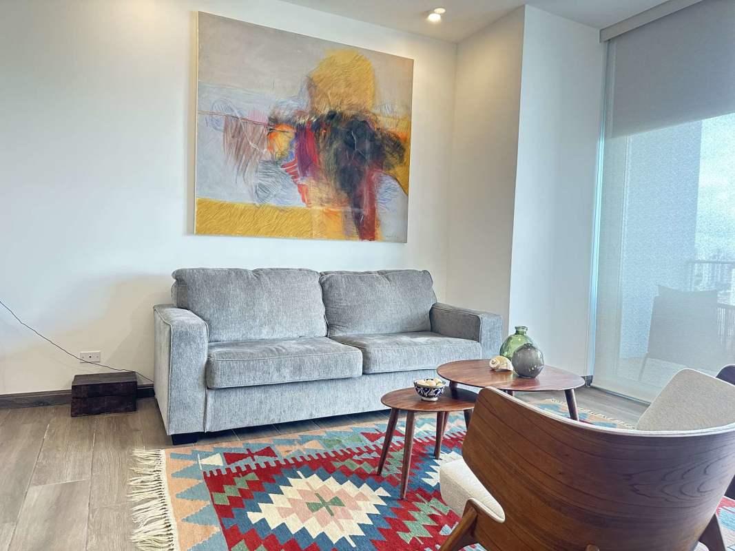 Modern living area with panoramic ocean and city views, floor-to-ceiling windows & balcony PH Destiny Panama