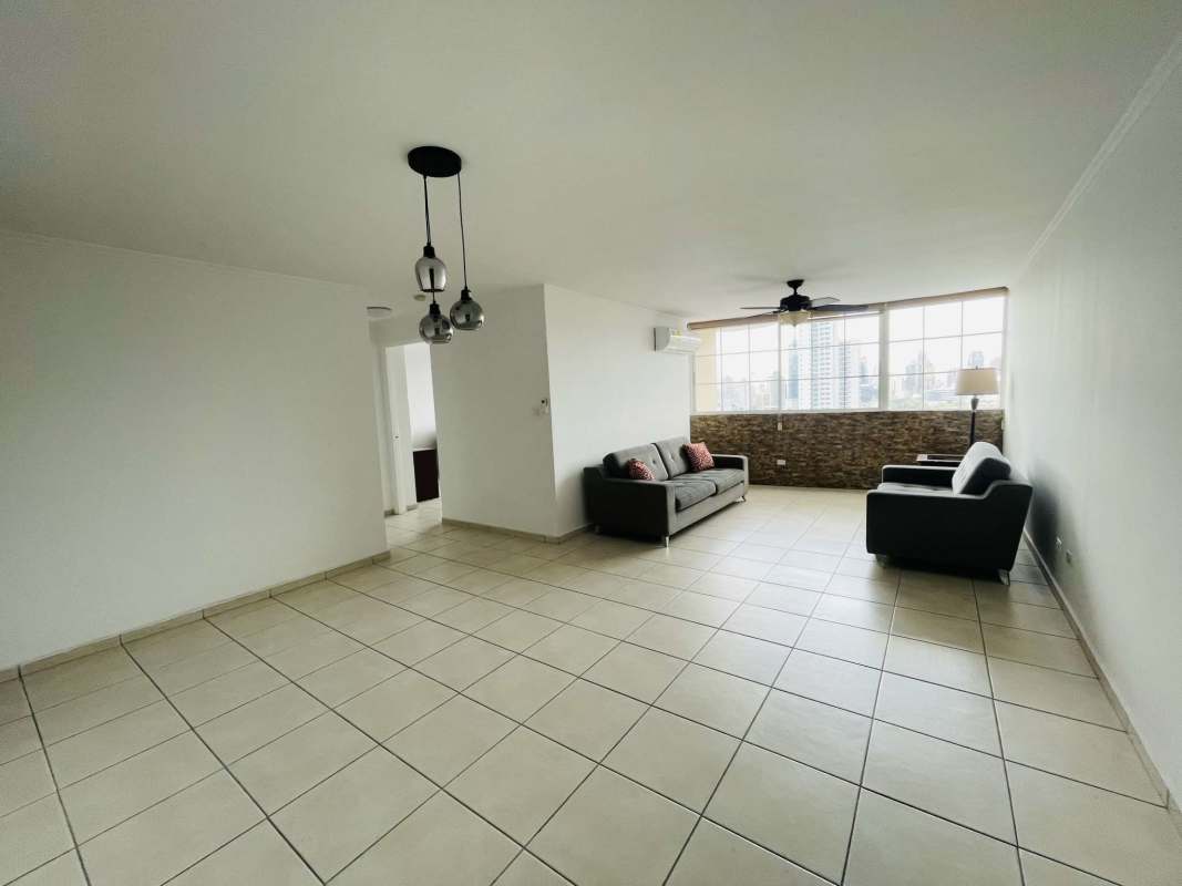 Kitchen with granite countertop, mosaic backsplash, and appliances in PH San Francisco Skyline Panama