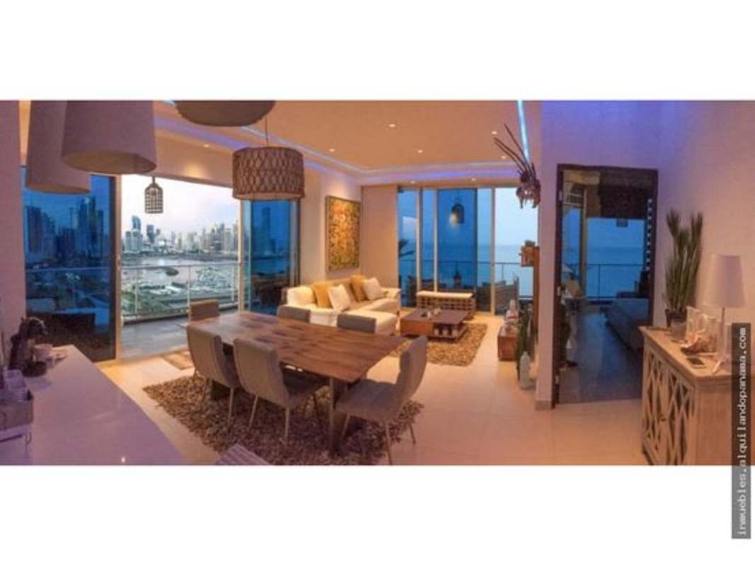 Modern open-plan living dining with floor-to-ceiling windows and sea views PH Sky Lounge Panama