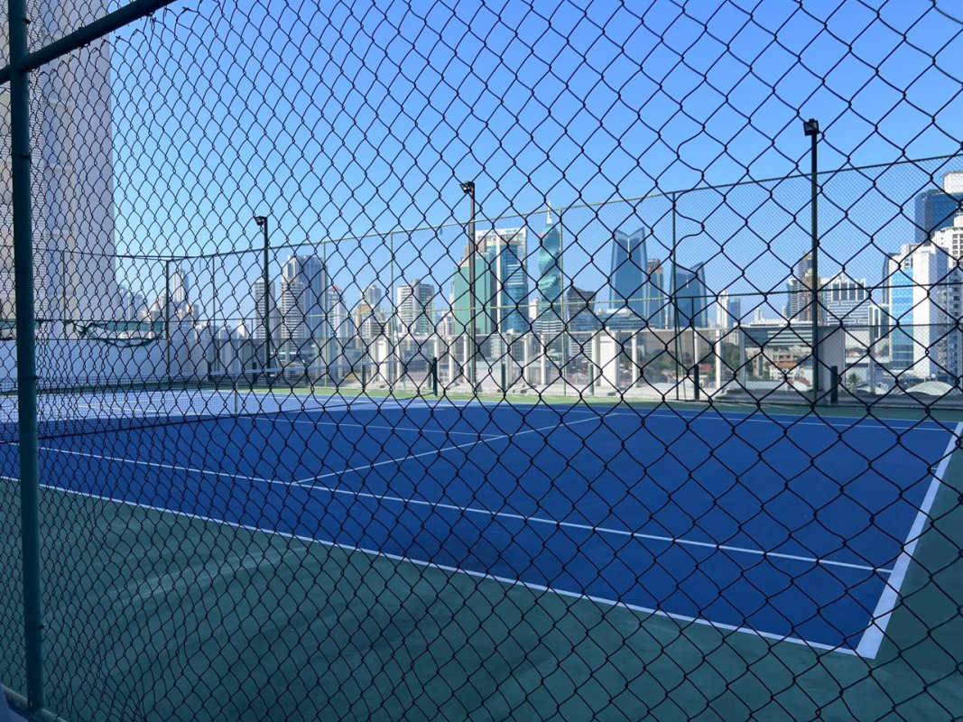 Indoor squash court with glass wall inside PH The Towers luxury condo building in Panama City