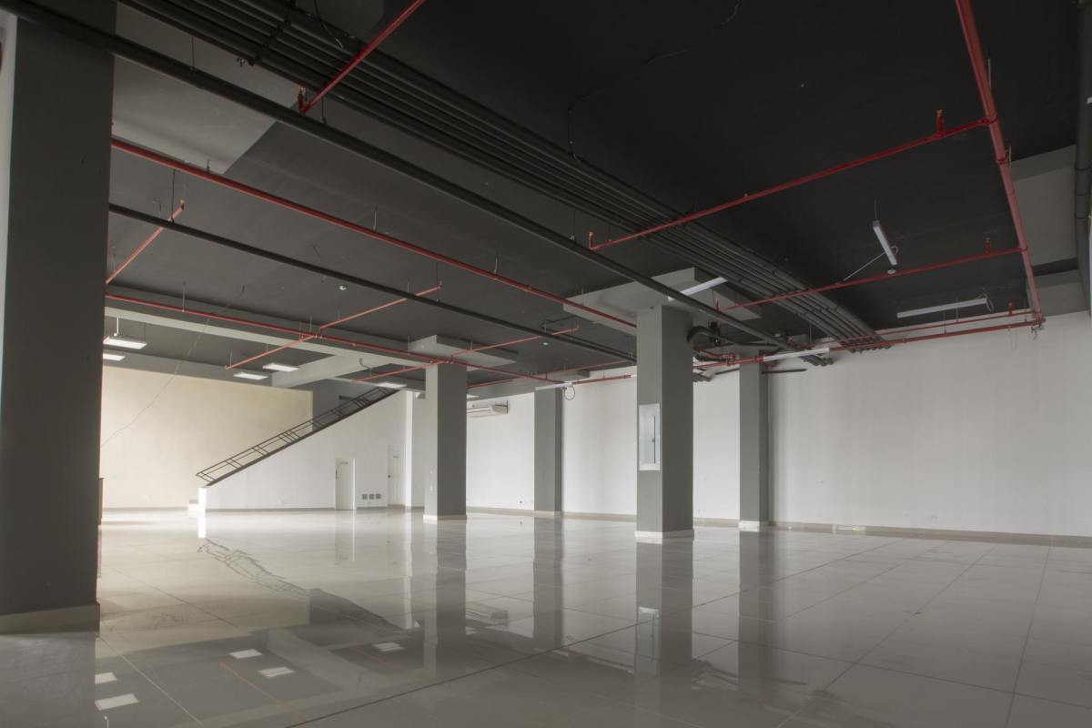 Interior open plan commercial space with glass wall Royal Blue Plaza Panama City