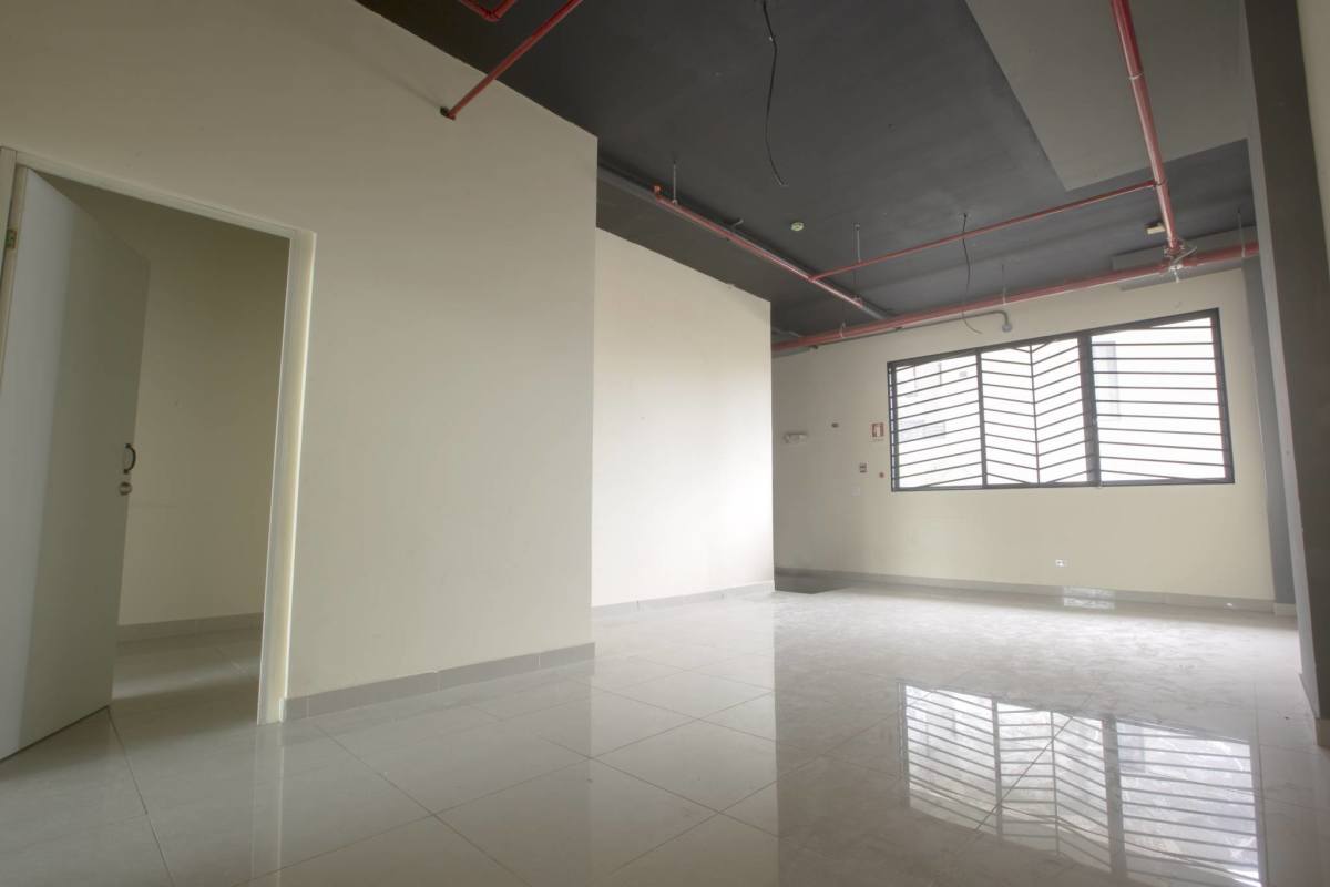 Open industrial interior with high ceiling for business leasing in Royal Blue Plaza Panama City