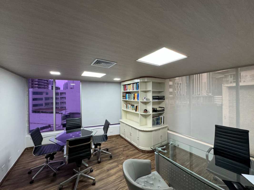 Executive office with glass table and panoramic city views in PH Obarrio Business Tower Panama