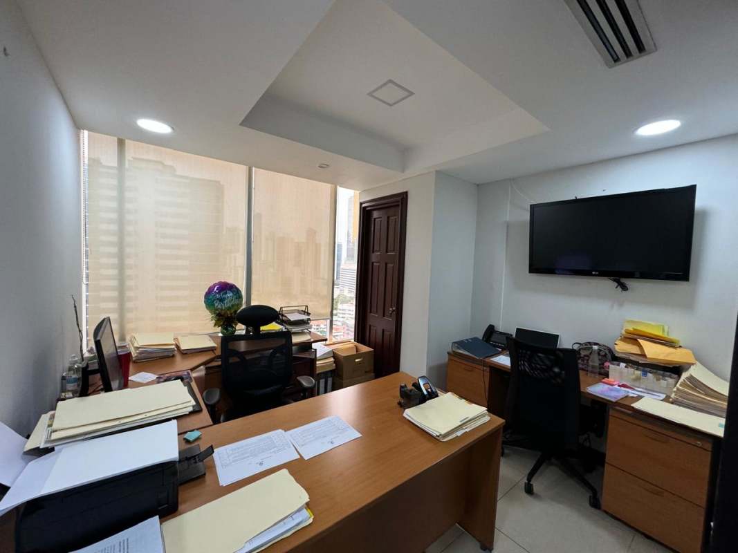 Private office with large window showing Panama skyline in PH Obarrio Business Tower