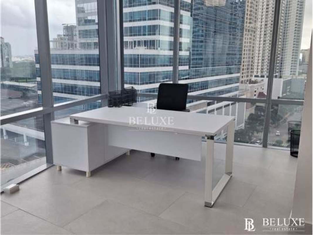 Private corner office with floor-to-ceiling panoramic windows city view Costa del Este Prime Time Tower
