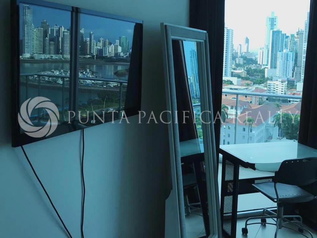 Living room with flat screen TV unit black stand modern finishes PH Destiny Panama apartment