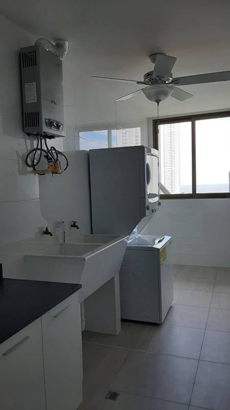 Bright living dining room with floor-to-ceiling windows and balcony access in PH Park View