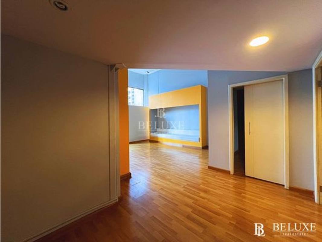 Large open office or commercial space with partition walls and ceiling lights San Francisco Panama