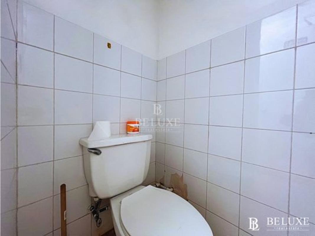 Interior hallway with ceramic tiles and office access El Dorado Panama City