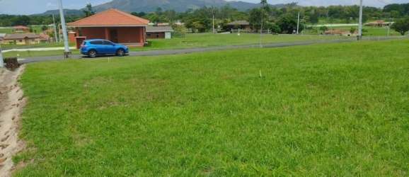 Large community pool with sun deck and garden area in PH El Celaje Chame Panama